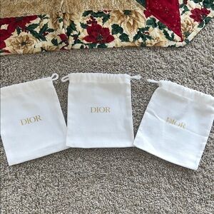 Dior Gold Logo White Pouches